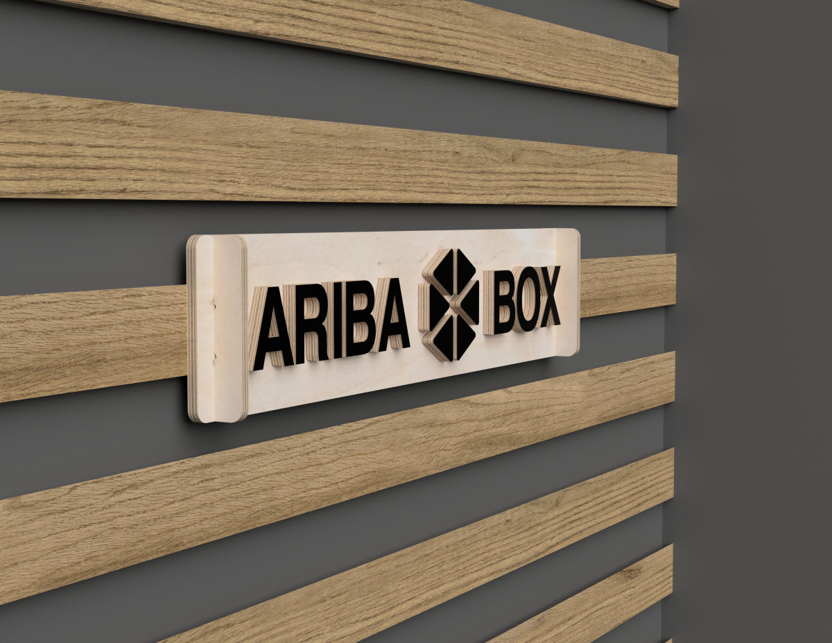 Aribabox logo French cleat attachment mounted on workshop wall