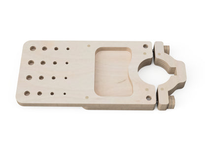 Close-up of CNC-machined bit slots on plywood holder