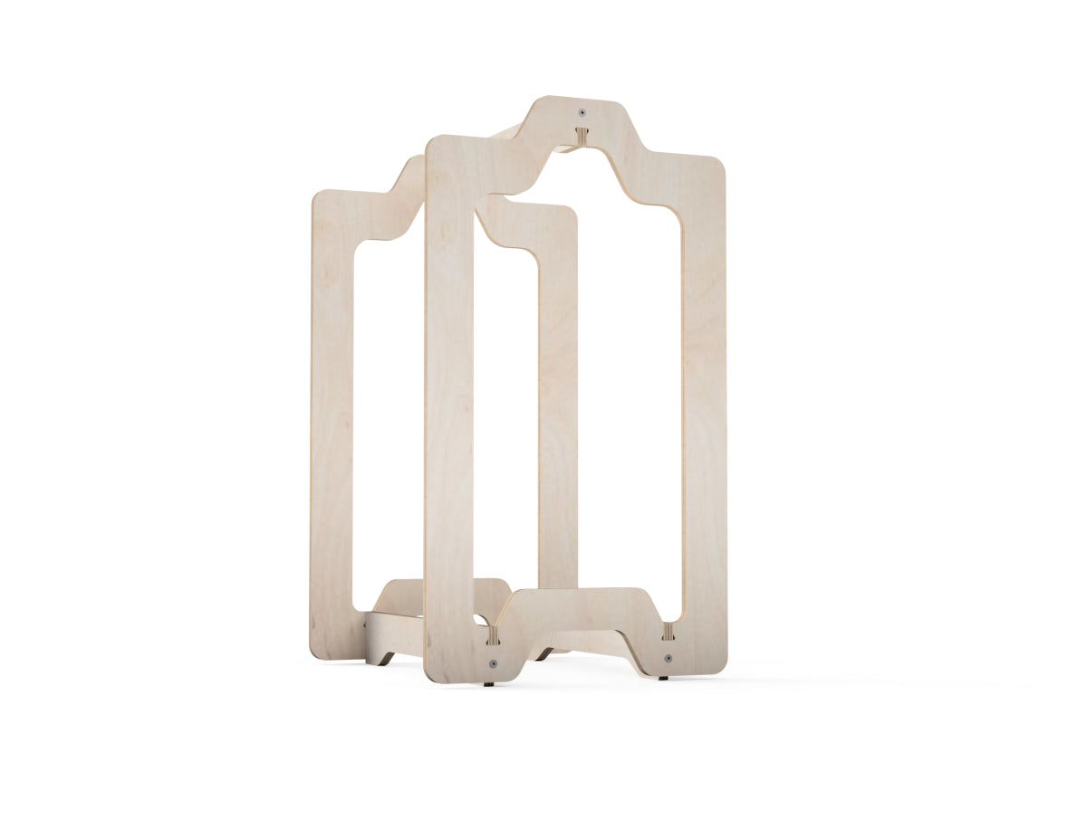 Side view of CNC plywood firewood carrier with curved handles