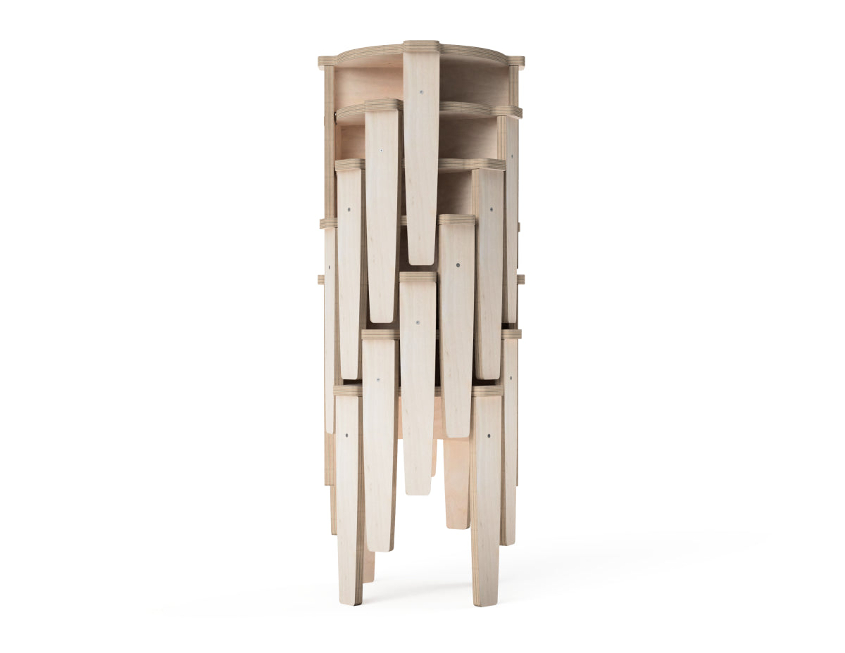 Modern ergonomic plywood stools stacked for compact storage