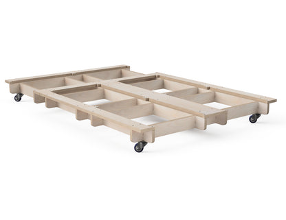 CNC plywood cabinet base with caster wheels installed