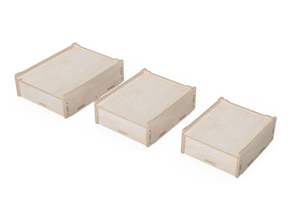 Stackable plywood storage boxes with lids in three different sizes